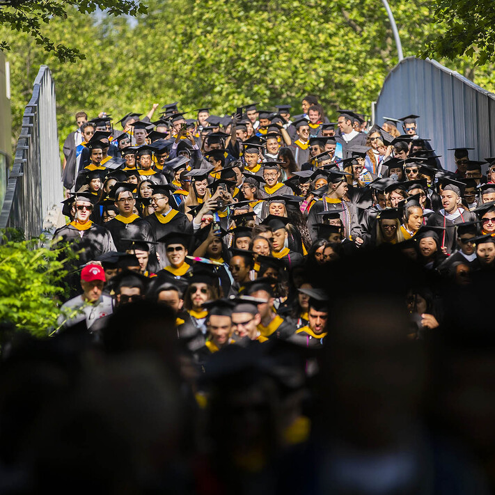 Commencement procession crossing the 38th St bridge